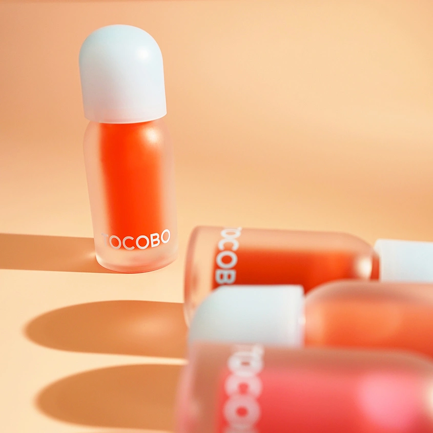 Масло для губ `TOCOBO` 15 CORAL SODA для придания объема губам 4 г