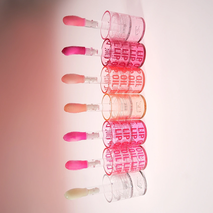 Масло для губ `REVOLUTION` POUT LIP OIL ухаживающее с фруктовым ароматом тон Glam pink shimmer