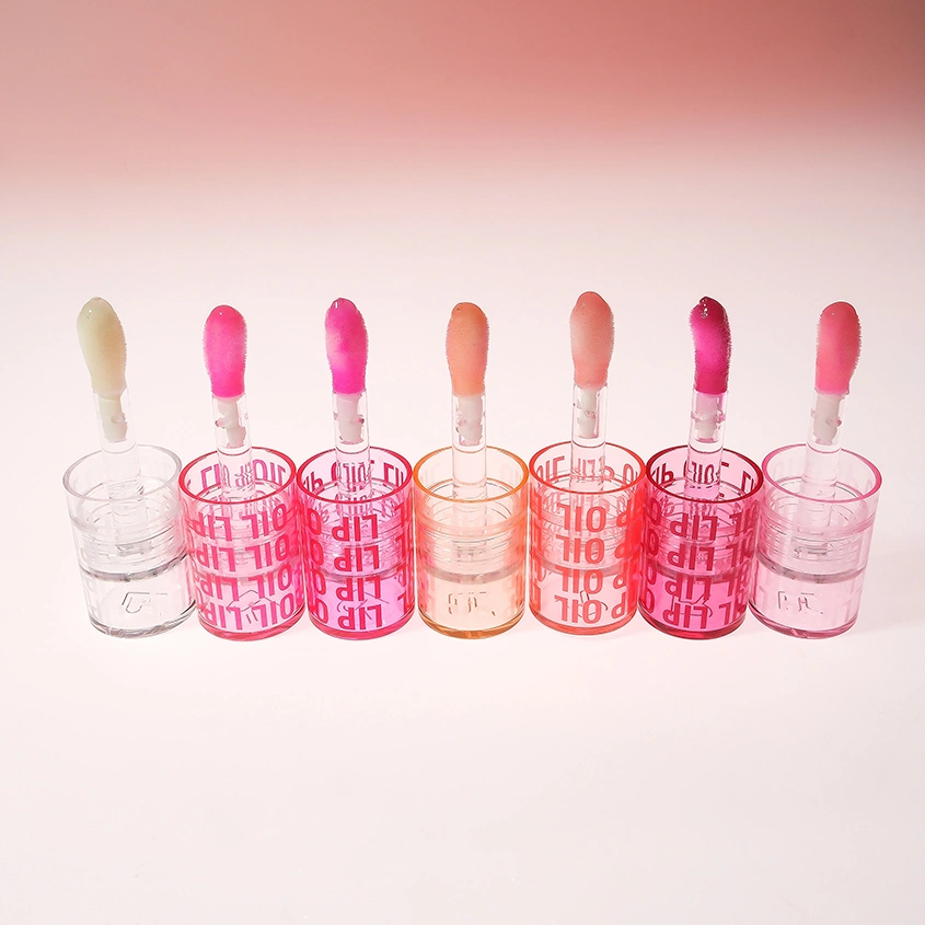 Масло для губ `REVOLUTION` POUT LIP OIL ухаживающее с фруктовым ароматом тон Glam pink shimmer