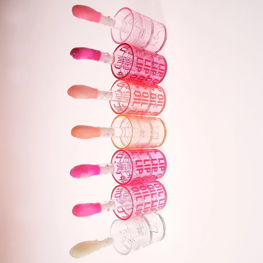 Масло для губ `REVOLUTION` POUT LIP OIL ухаживающее с фруктовым ароматом тон Glam pink shimmer